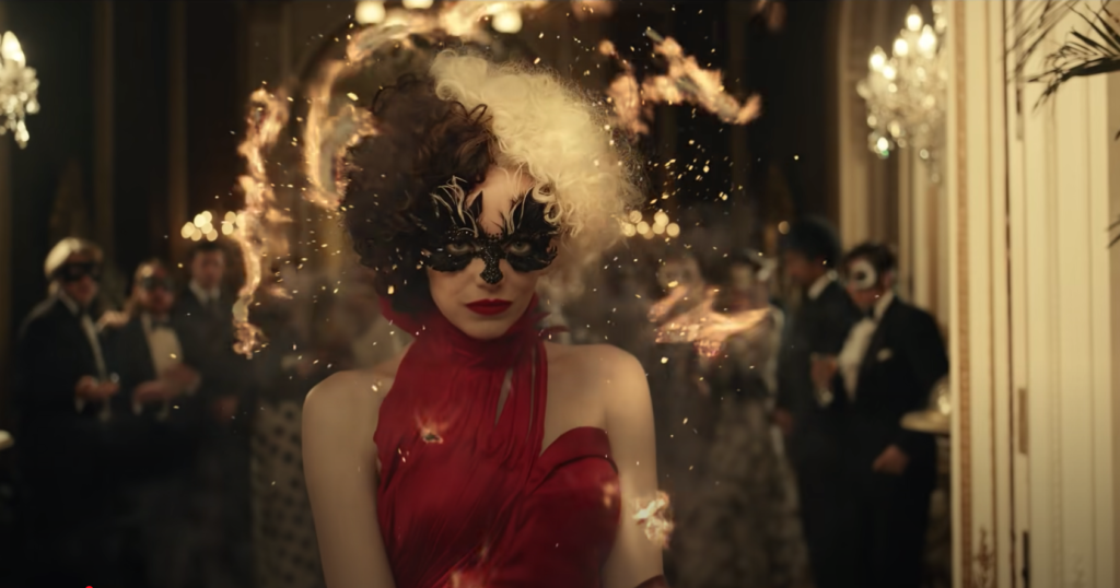 cruella red dress at dinner party
